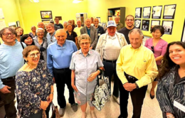Group of seniors standing together smiling