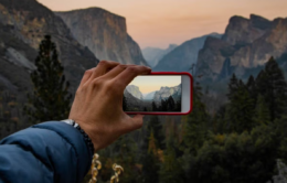 Person taking a photo of El Capitan at Yosemite